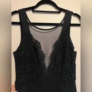 Lulus dress, size L, black with black lace on top, mesh neckline, deep V cut.